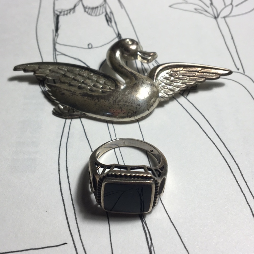 Ring . Silver with black stone